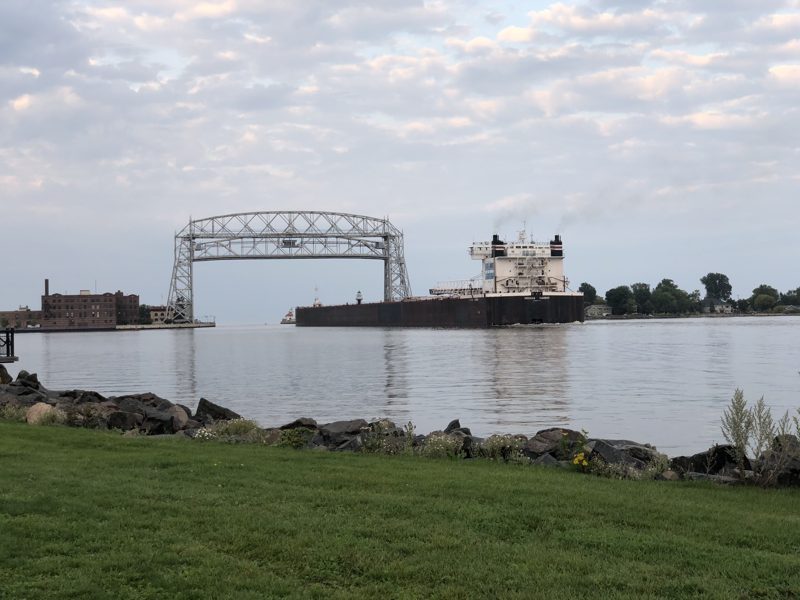 Ore boat passing under the Duluth Aerial Lift Bridge