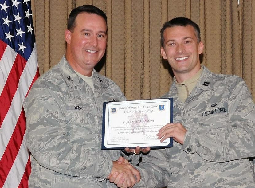 Captain David Madgett in U.S. Air Force uniform at an award ceremony, Grand Forks Air Force Base
